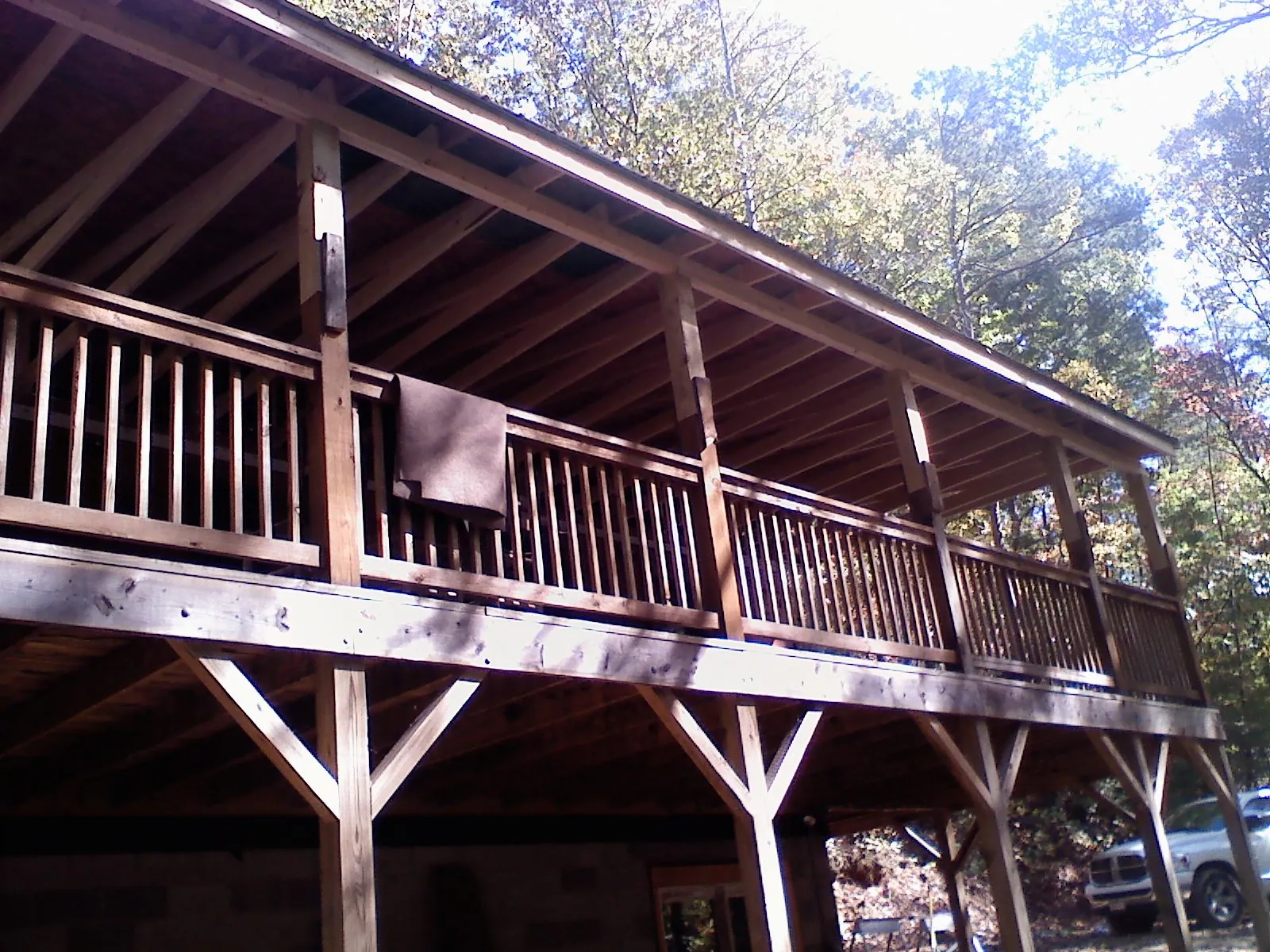 Timber framing under a new elevated porch and deck — Roof Leak Repair in Toddville by Roofing Brothers